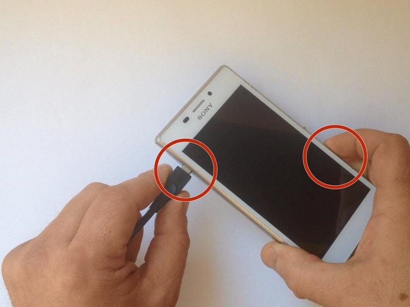 Holding Volume Down While Connecting Usb